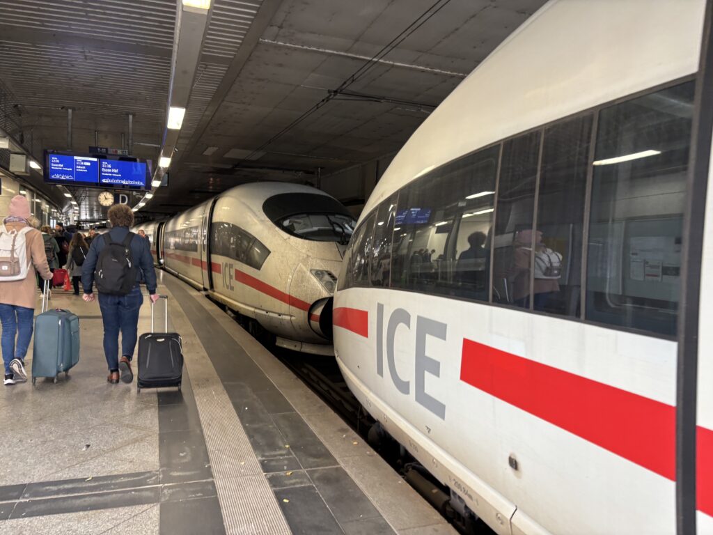 A view of two coupled high-speed trains from the platform